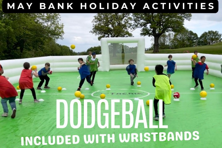 Children playing dodgeball in an inflatable arena.